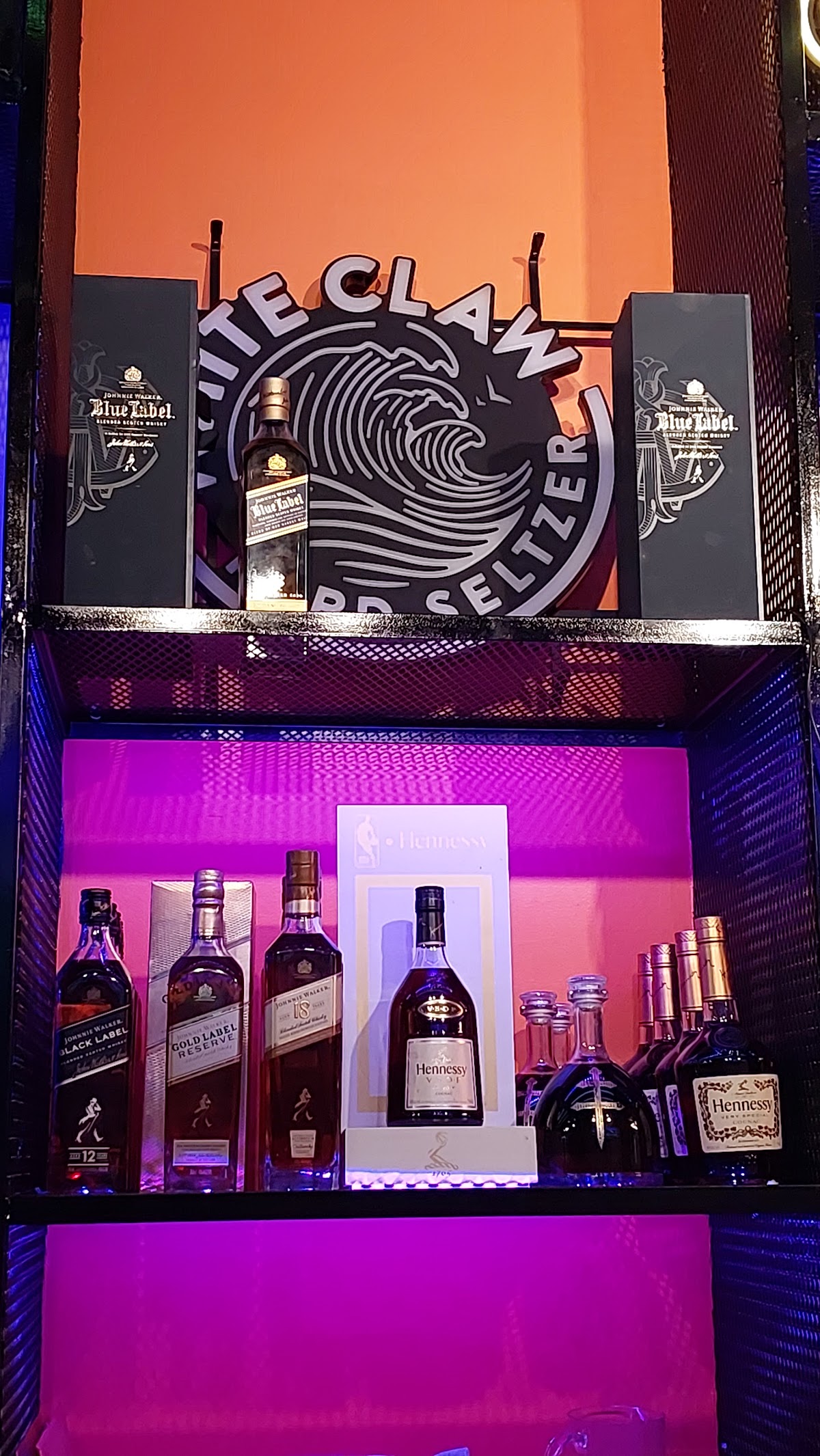 The bar at PreGame Dyckman — drinks display
